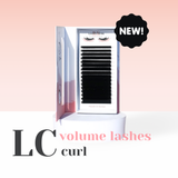 Eyelash packaging with 'NEW!' label and 'LC volume lashes curl' text on a pink background