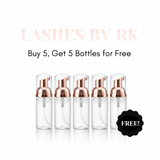 Set of 5 Free clear lash bottles with rose gold caps.